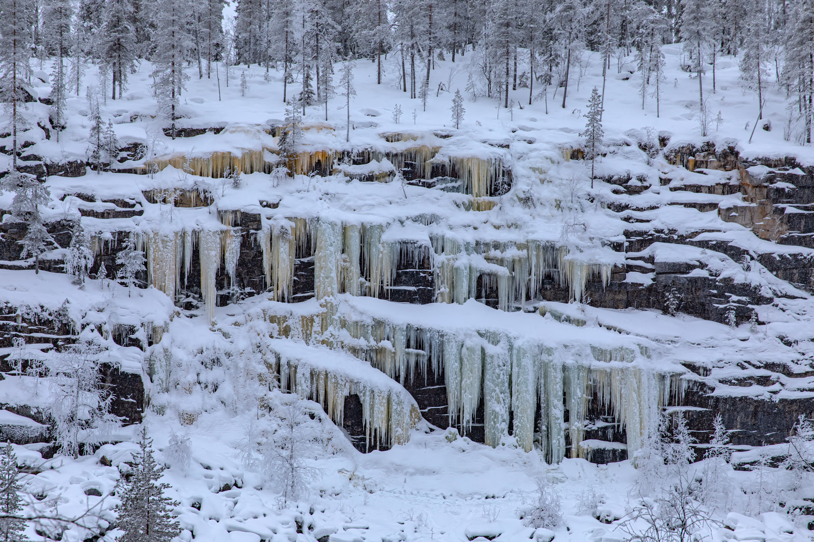 Frozen cascades across the rock shelves of Korouoma canyon